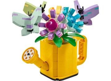 Les fleurs dans l'arrosoir